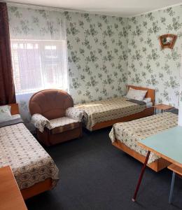 Letto o letti in una camera di Podsolnukhi Guest House
