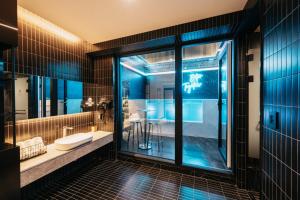 Koupelna v ubytování Cozy Tree Hotel Seomyeon + 19 fotografií
