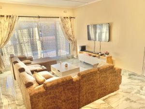 Posezení v ubytování Coast Haven