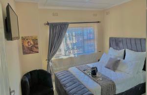 Postel nebo postele na pokoji v ubytování Coast Haven