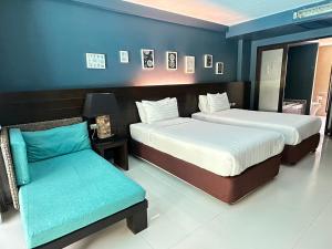 Postel nebo postele na pokoji v ubytování The Bihai Hua Hin