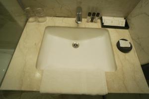 Koupelna v ubytování Hotel Krinoscco