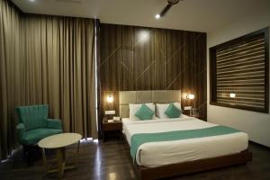 Postel nebo postele na pokoji v ubytování Hotel Krinoscco
