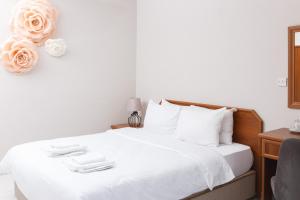 Кровать или кровати в номере Homelike Guest house