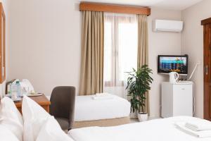 Кровать или кровати в номере Homelike Guest house