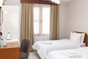Кровать или кровати в номере Homelike Guest house