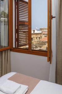 Кровать или кровати в номере Homelike Guest house