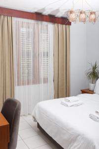 Кровать или кровати в номере Homelike Guest house