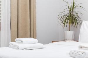 Кровать или кровати в номере Homelike Guest house