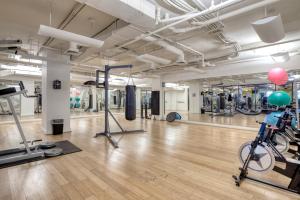 a gym with exercise equipment and exercise bikes at U Street 1br w gym wd nr metro dining WDC-676 in Washington