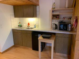 Kuchyň nebo kuchyňský kout v ubytování Casa da Tini