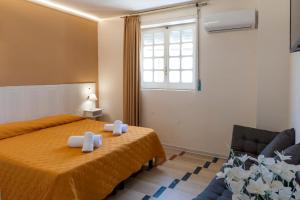 Postel nebo postele na pokoji v ubytování SOLARIS PAESTUM + 37 fotografií