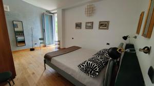 Katil atau katil-katil dalam bilik di Guest House Birrificio Abruzzese