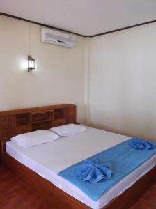Postel nebo postele na pokoji v ubytování Lamai Resort