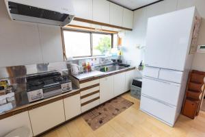 Kuchyň nebo kuchyňský kout v ubytování Goto I-House