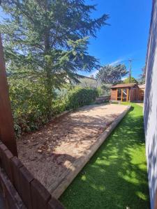 a garden with a tree in the middle of a yard at Gîte G2735 in Saint-Maximin-la-Sainte-Baume