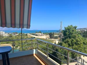 a balcony with a view of the ocean at Onis Sea View Apartments in Orikum