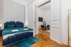 Televízia a/alebo spoločenská miestnosť v ubytovaní Venus Apartments - Oktogon II