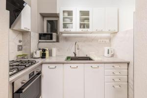 Kuchyňa alebo kuchynka v ubytovaní Venus Apartments - Oktogon II