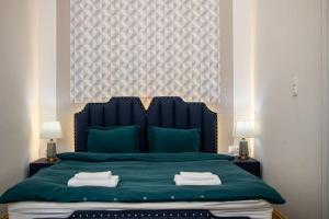 Posteľ alebo postele v izbe v ubytovaní Venus Apartments - Oktogon II
