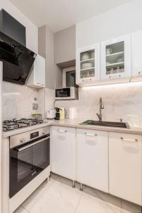 Kuchyňa alebo kuchynka v ubytovaní Venus Apartments - Oktogon II