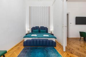Posteľ alebo postele v izbe v ubytovaní Venus Apartments - Oktogon II