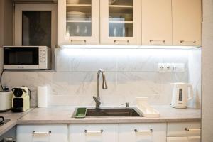 Kuchyňa alebo kuchynka v ubytovaní Venus Apartments - Oktogon II