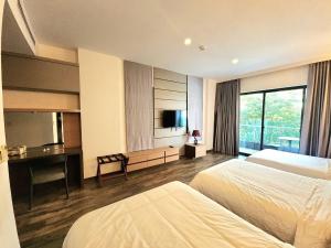 Ένα ή περισσότερα κρεβάτια σε δωμάτιο στο CHILCHILL Hotel Riverside