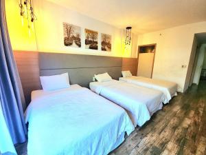Ένα ή περισσότερα κρεβάτια σε δωμάτιο στο CHILCHILL Hotel Riverside