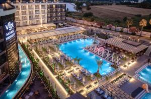 an overhead view of a hotel pool at night at Vox Maris Resort - Ultra All Inclusive in Side