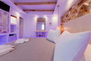 Voodi või voodid majutusasutuse Mikri Vigla Hotel Beach Resort toas