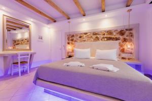 Voodi või voodid majutusasutuse Mikri Vigla Hotel Beach Resort toas