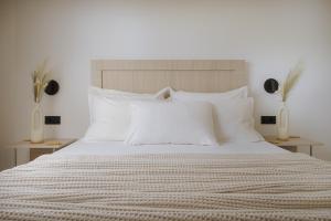 Postel nebo postele na pokoji v ubytování Abelia Boutique Rooms