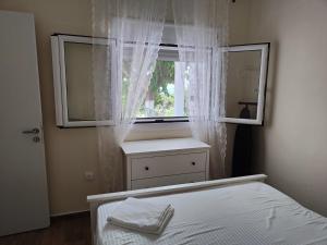 Naktsmītnes Asmini Beach Apartments #2 pilsētā Asmínion fotogalerijas attēls +9 fotogrāfijas