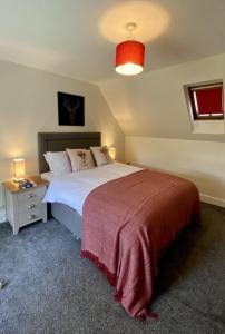 Voodi või voodid majutusasutuse Lagnakeil House toas