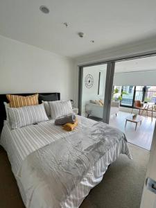 Postel nebo postele na pokoji v ubytování Stylish Apartment