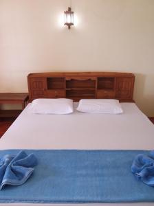 Postel nebo postele na pokoji v ubytování Lamai Resort
