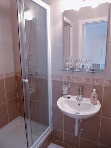 Kúpeľňa v ubytovaní Guest House Kosec + 9 fotografií