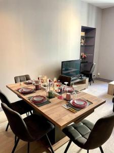 Μια τηλεόραση ή/και κέντρο ψυχαγωγίας στο Appartement pour 5 voyageurs