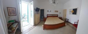 Postel nebo postele na pokoji v ubytování Albergo Regina