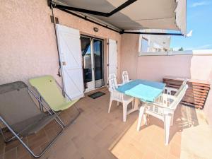 Balkón alebo terasa v ubytovaní MARSEILLAN-PLAGE - Studio climatisé avec coin nuit séparé - Terrasse & parking privé