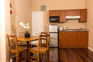 A kitchen or kitchenette at The Durban Hotel Guyana INC.