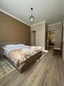 Llit o llits en una habitació de Baqari Inn