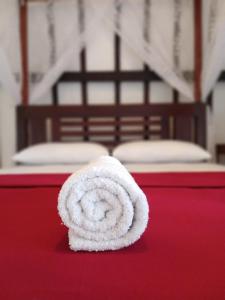 Tempat tidur dalam kamar di Alen's Stay&surf