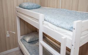 Postel nebo postele na pokoji v ubytování Domki Letniskowe "Morskie" Władysławowo-Chłapowo