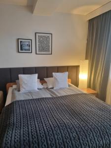 Łóżko lub łóżka w pokoju w obiekcie Apartament Granat