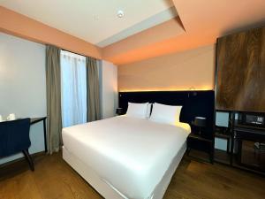 Postel nebo postele na pokoji v ubytování Design Hotel & Private Spa - Tbilisi Edition