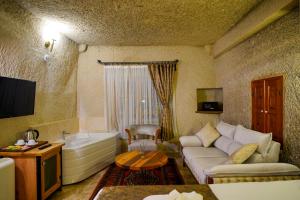 TV a/nebo společenská místnost v ubytování Cave Hotel Saksagan