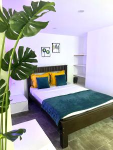 Katil atau katil-katil dalam bilik di Maison da Praia