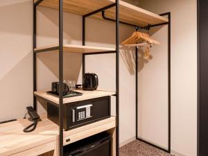 Příslušenství pro přípravu čaje a kávy v ubytování Comfort Hotel Takamatsu